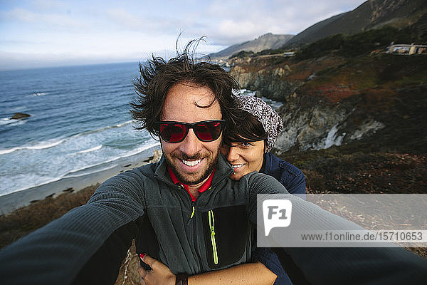 USA California Couple taking selfie on Pacific Coast