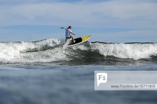 SUP surfer Bali Indonesia