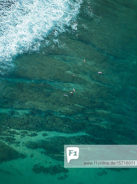 Indonesia  Sumbawa  Aerial view of group of surfers