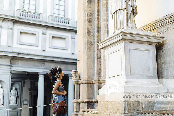 Young woman exploring the city  Florence  Italy