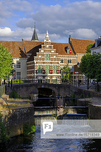 Netherlands  Utrecht  Amersfoort  Arch bridge over river Eem canal with history museum in background