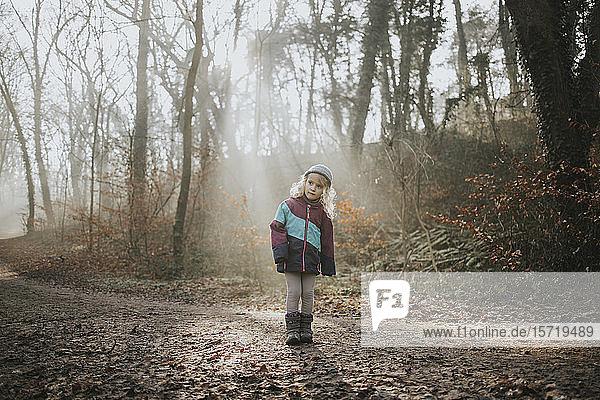 Girl during forest walk