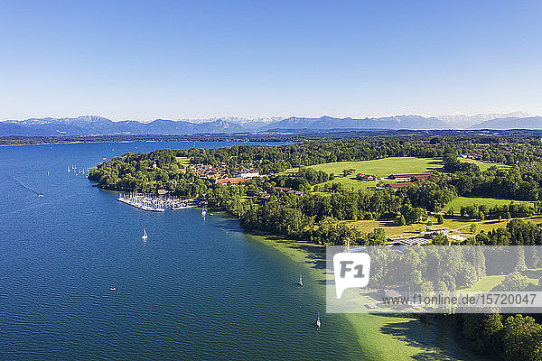 Germany  Bavaria  Bernried am Starnberger See  Aerial view of harbor on shore of Lake Starnberg with mountains in distant background