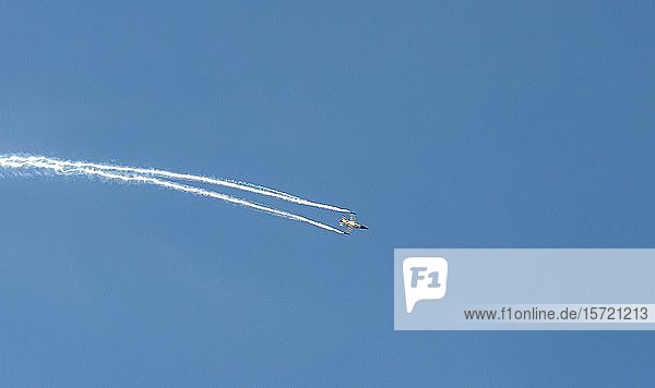 Military aircraft in flight  Fighting Falcon F-16 by Lockheed Martin  Airshow  Paris  France  Europe