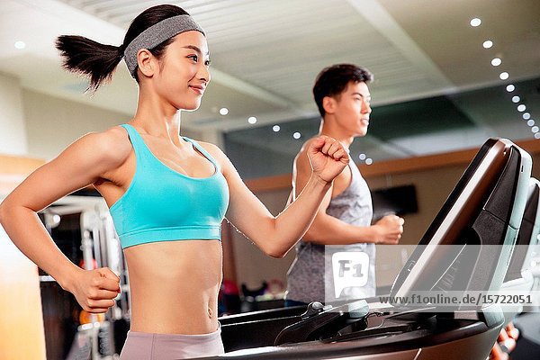 Young people in the gym to work out