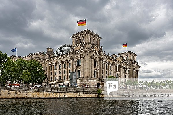 Reichstag with waving German flag at the Spree  government quarter  Berlin  Germany  Europe