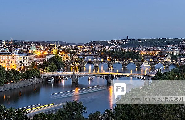 City view  bridges over the river Vltava  Charles Bridge with Old Town Bridge Tower and Water Tower  evening mood  Prague  Bohemia  Czech Republic  Europe