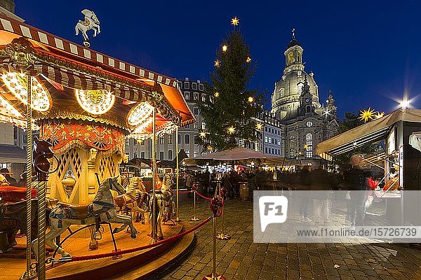 Advent on the Neumarkt  Christmas market in front of the Church of Our Lady with historical carousel  Dresden  Saxony  Germany  Europe