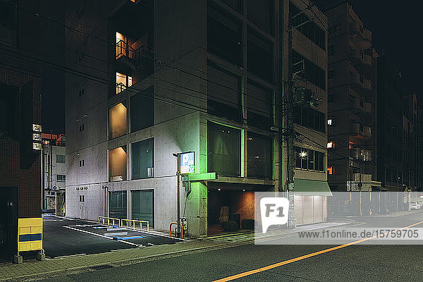 Night scene of multistorey office buildings Osaka Japan