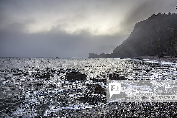 Tranquil rocky ocean beach Playa de Portizuela Spain