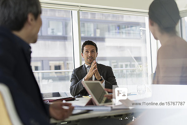 Businessman talking in conference room meeting