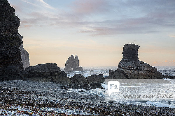 Rock formations in ocean Portizuela Beach Asturias Spain