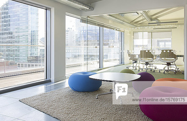 Creative open plan office space with bean bag chairs