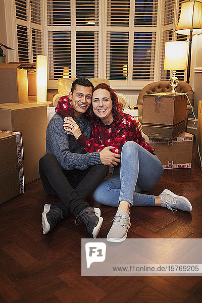 Portrait happy  affectionate couple moving house