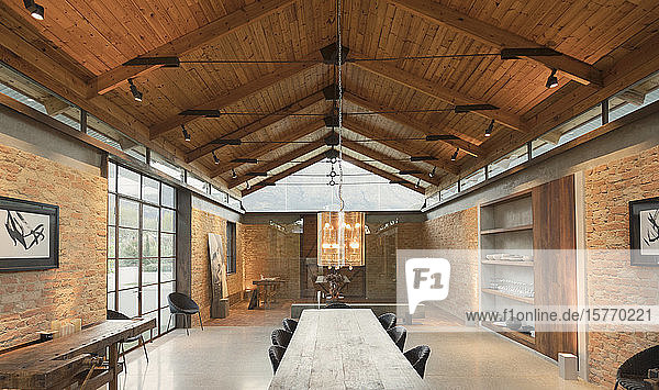 Home showcase interior with vaulted wood ceiling