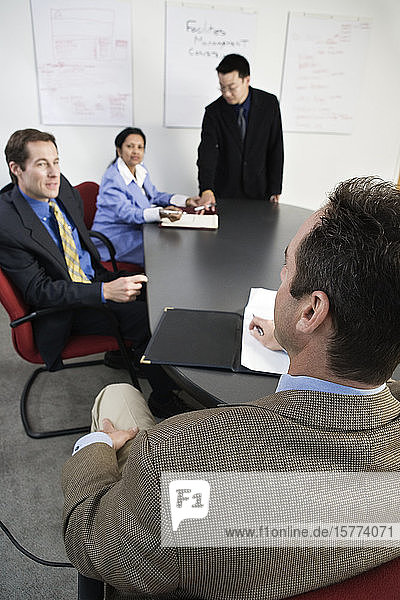 View of businesspeople in an office.