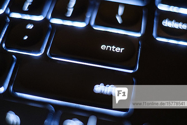Illuminated 'enter' key on keyboard
