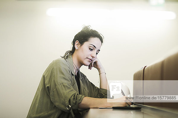 Woman working in an office.