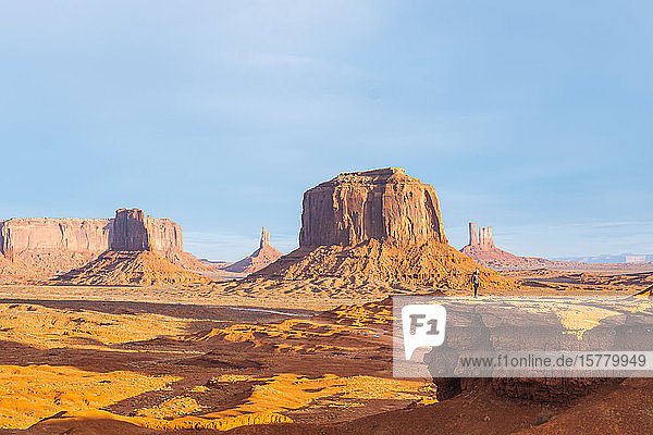 The view across buttes and sandstone formations in Monument Valley.
