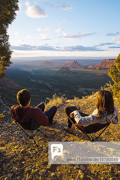 Couple admiring view over Moab  Utah  US