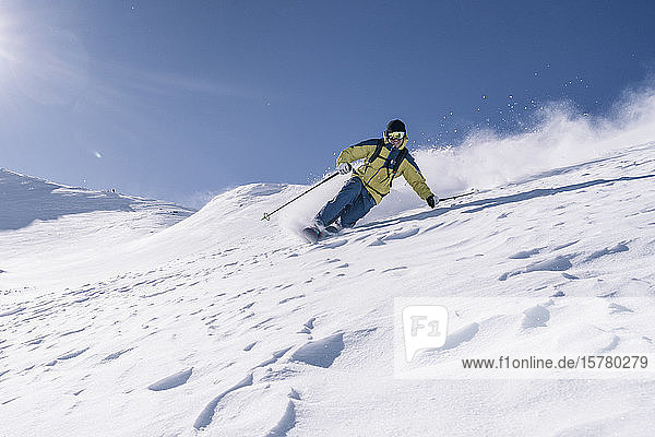 Skier  downhill skiing  Grisons  Switzerland