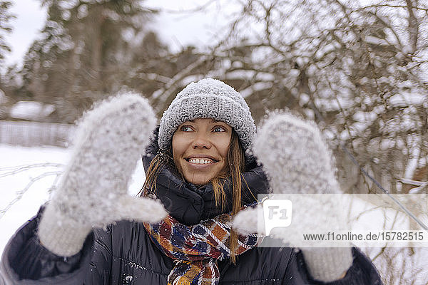 Portrait of happy woman in winter