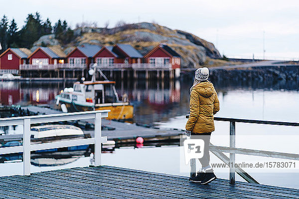 Tourist enjoying the view at Hamnoy  Lofoten  Norway