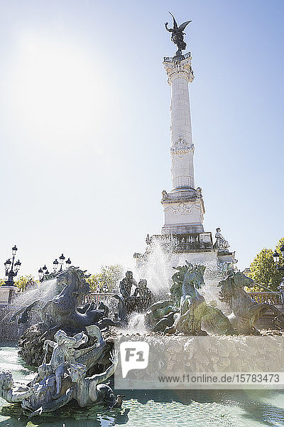 France Gironde Bordeaux Sun shining over Monument aux Girondins