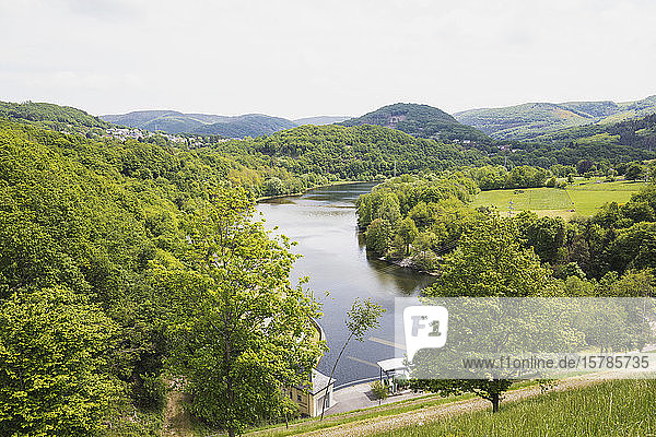 Germany North Rhine Westfalia Eifel Schwammenauel View from Rursee dam to Rur river and plunge pool