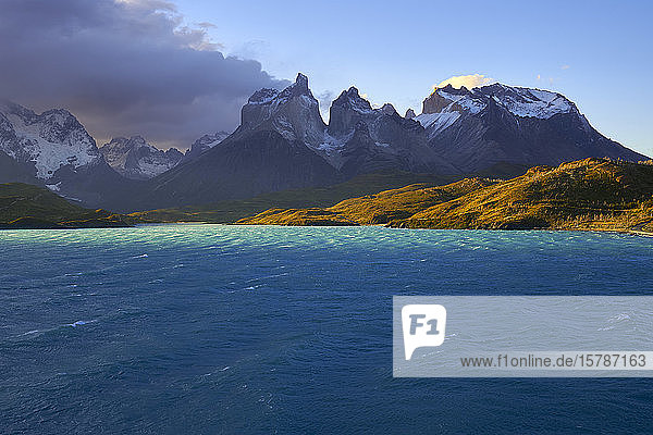 Chile  Ultima Esperanza Province  Blue waters of Lake Pehoe with Cuernos del Paine in background