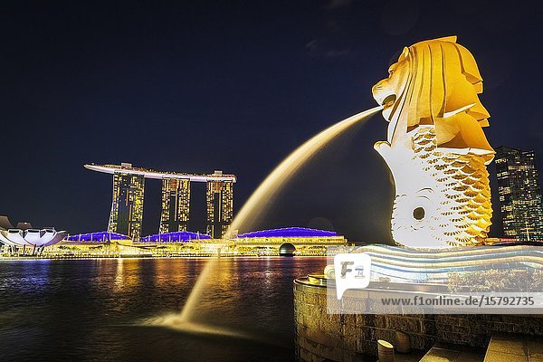 Merlion fountain and Marina Bay Sands at night Singapore Republic of Singapore.