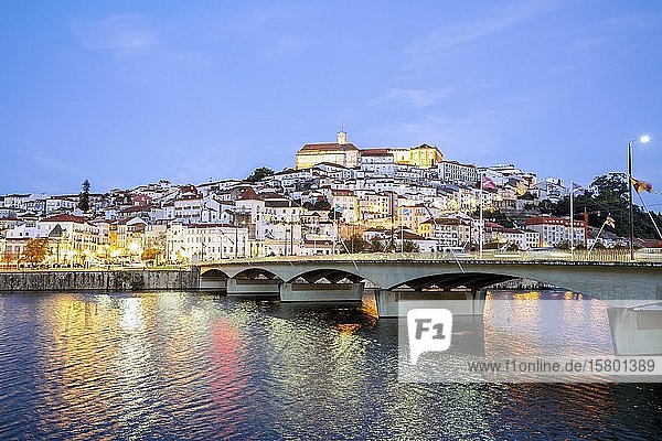 Cityscape with university at top of the hill in the evening  Coimbra  Portugal  Europe