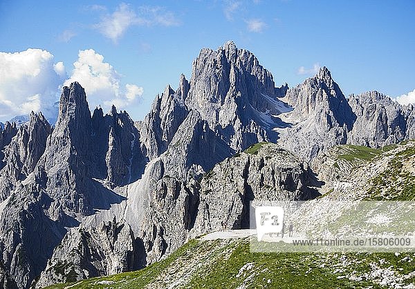 Mountain hiker  Cadini mountain group in the Sesto Dolomites  Province of Belluno  Italy  Europe