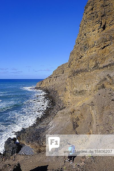 Woman hiking at the Playa de Guarinen  near Taguluche  La Gomera  Canary Islands  Spain  Europe