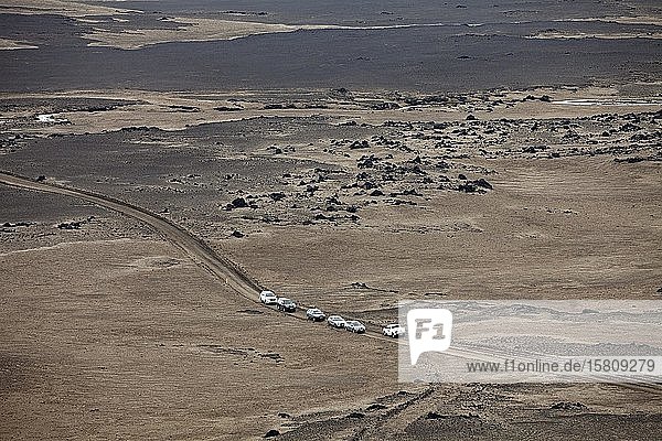 Desert-like landscape in the highlands with car traffic on gravel road  Dyngjufjöll  Iceland  Europe