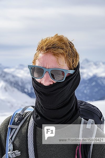 Ski tourer  man with sunglasses and scarf  portrait  Wattentaler Lizum  Tux Alps  Tyrol  Austria  Europe