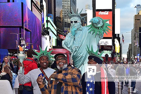 Statue of Liberty as photo object for tourists at Times Square Manhattan New York City New York State USA North America