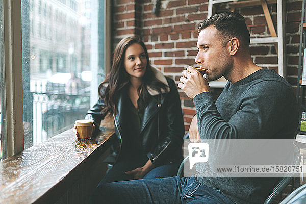 Couple having coffee in a cafe