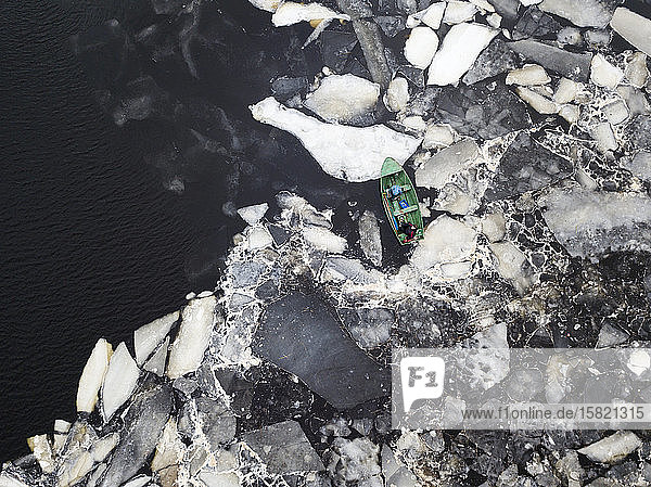 Russia Saint Petersburg Sestroretsk Aerial view of lone boat at icy shore of Gulf of Finland