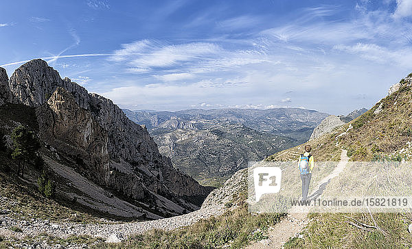 Woman hiking at Bernia Ridge  Costa Blanca  Alicante  Spain