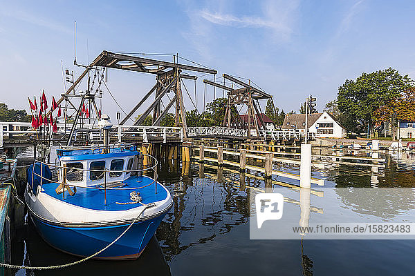 Germany  Mecklenburg-Western Pomerania  Greifswald  Fishing boat moored in front of bascule bridge
