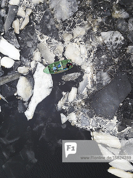 Russia Saint Petersburg Sestroretsk Aerial view of lone boat at icy shore of Gulf of Finland