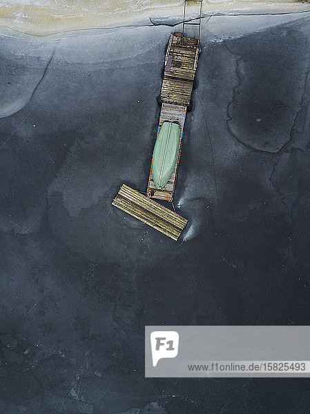 Russia Saint Petersburg Sestroretsk Aerial view of rowboat lying upside down on coastal jetty