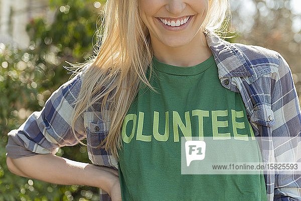 Woman in volunteer t-shirt