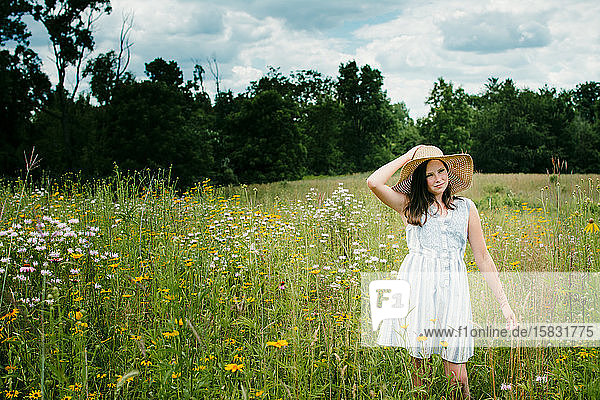 Teen Girl Walking Through a Wild Flower Field in Southern Michigan