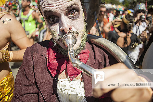 Man playing trombone in Rio street carnival