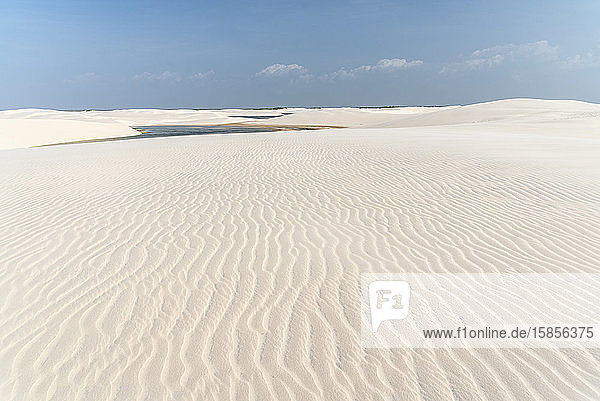 Beautiful view to white sand dunes and crystal clear rainwater lagoon