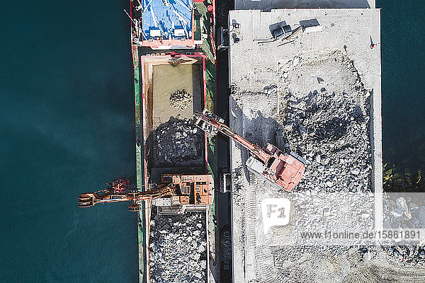 Mining machinery working on cargo ship