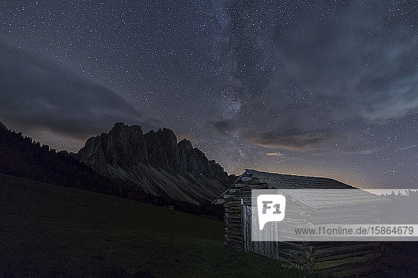 The Milky Way in the starry sky above the Odle Funes Valley South Tyrol Dolomites Italy Europe