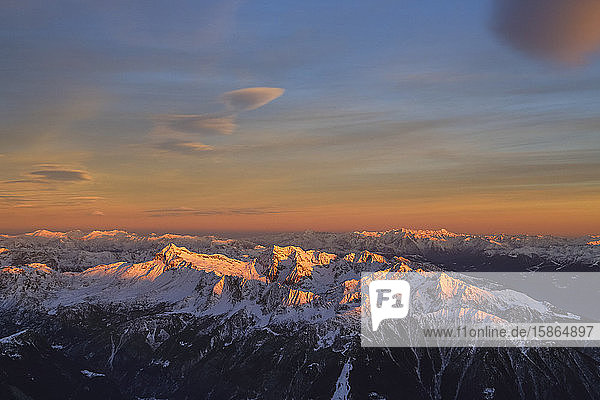 Aerial view of peak Scalino at sunset Masino Valley Valtellina Lombardy Italy Europe